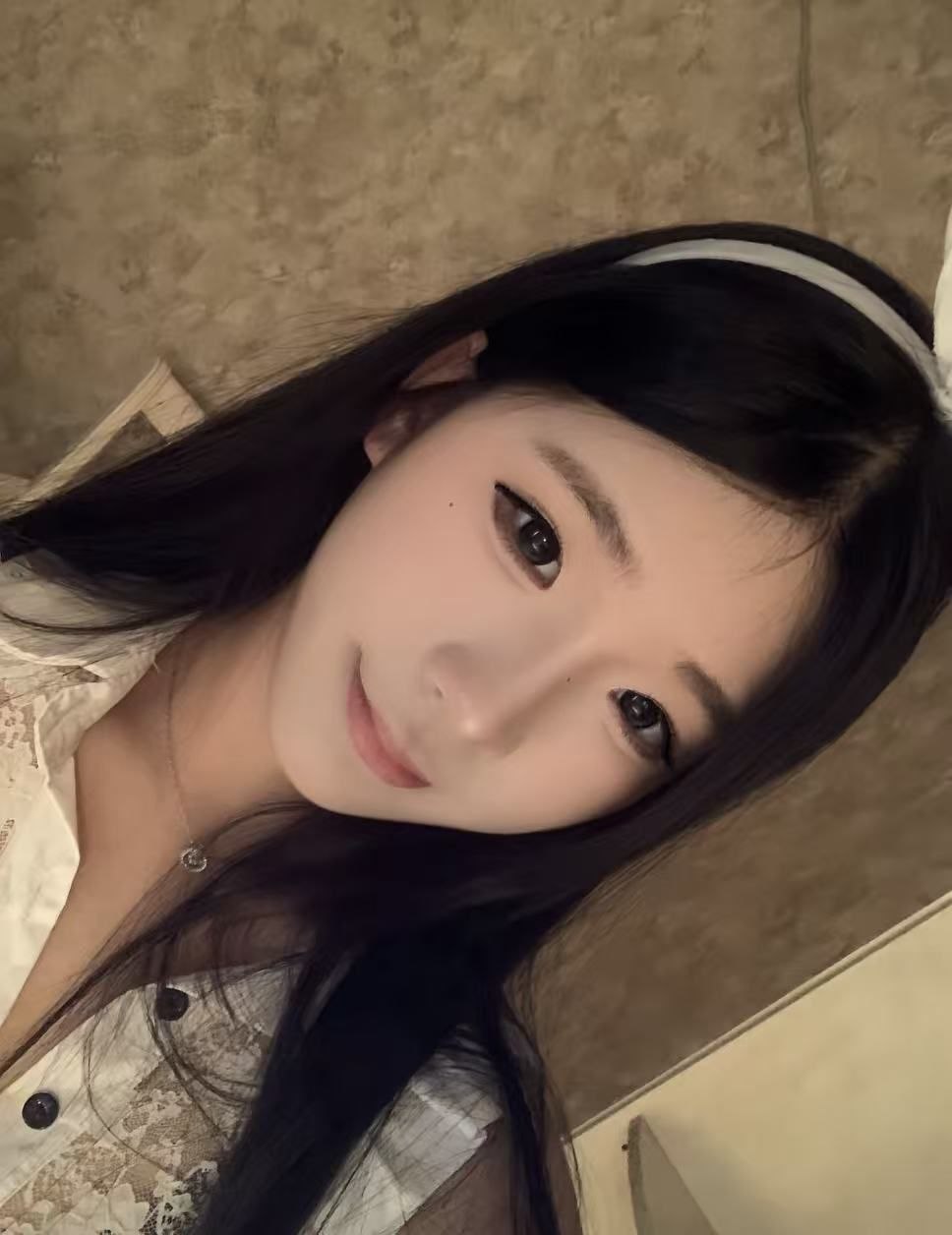 七七