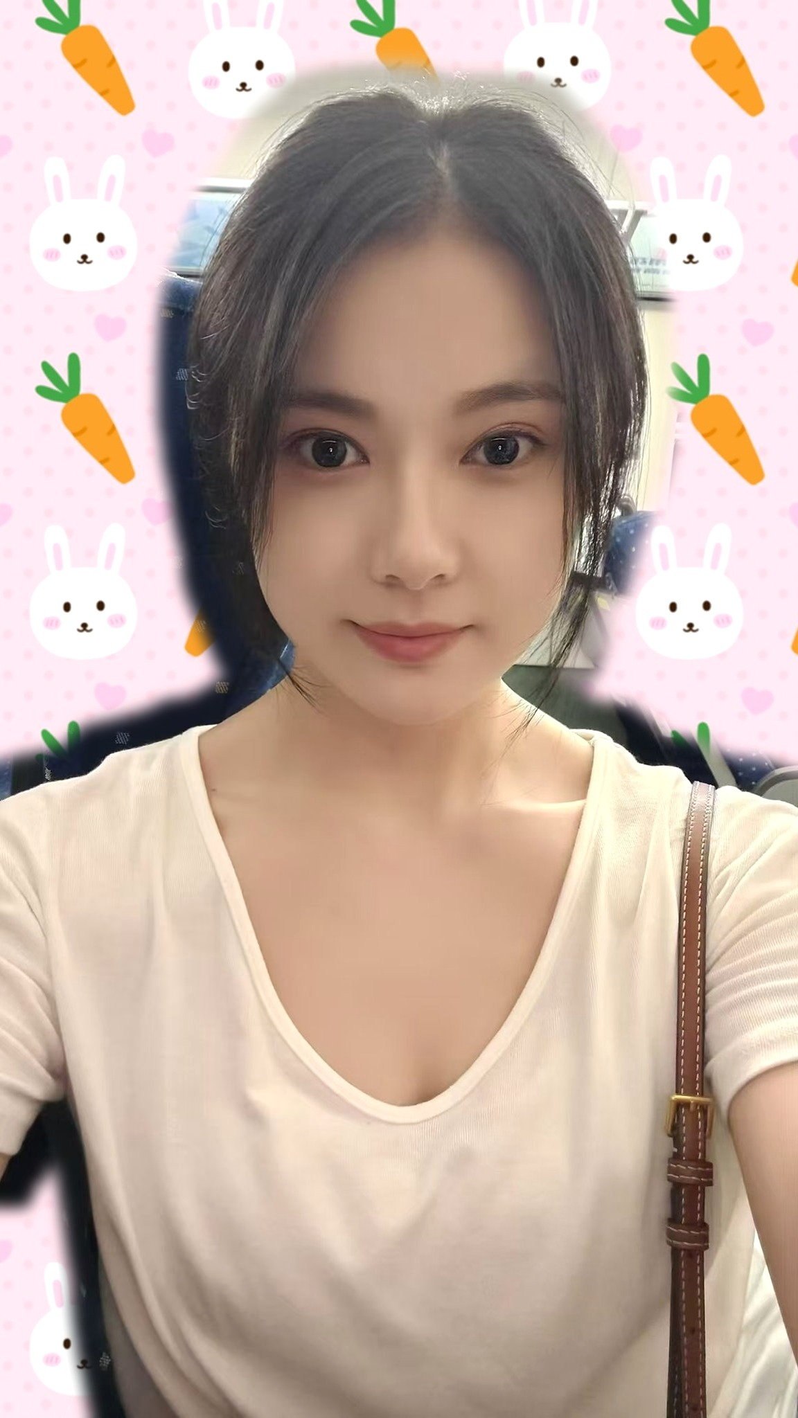 七七