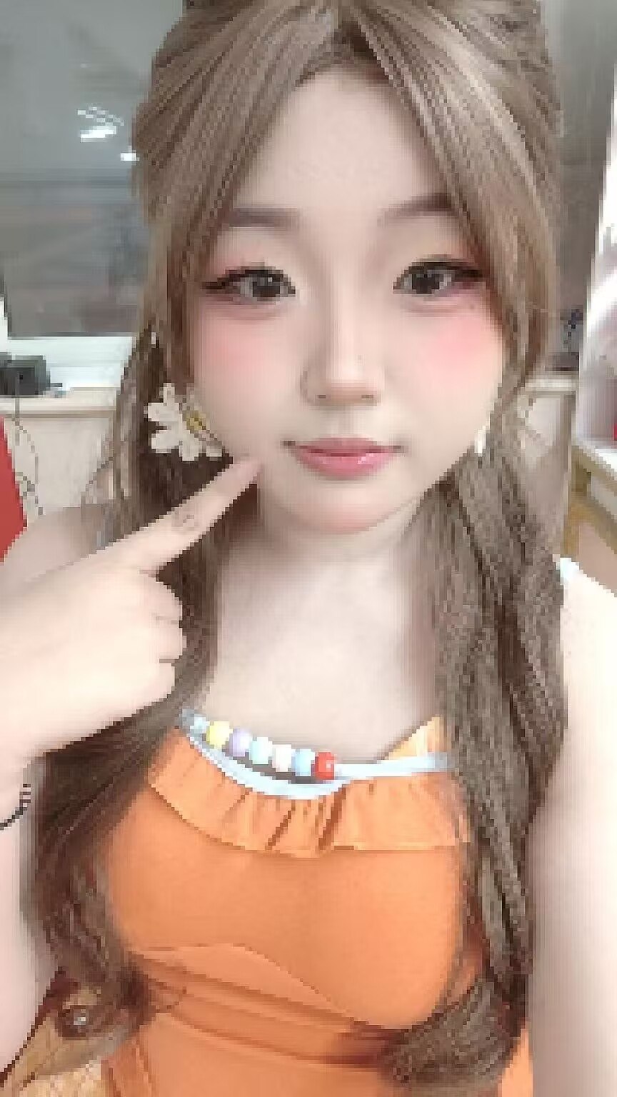 七七