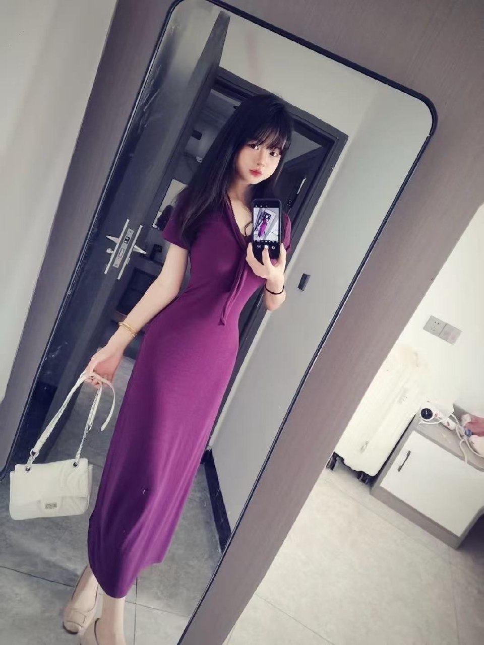 E075