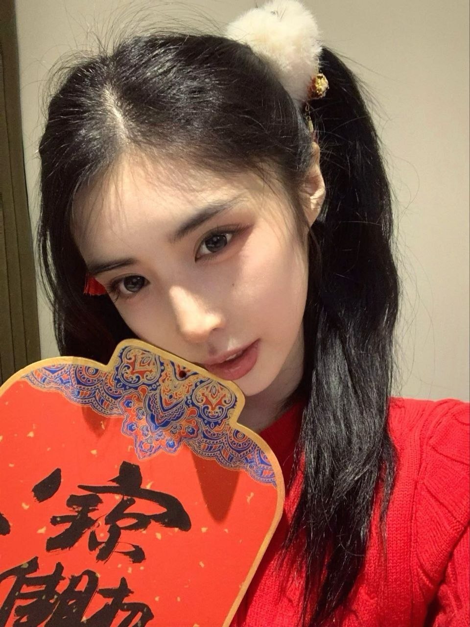 七七