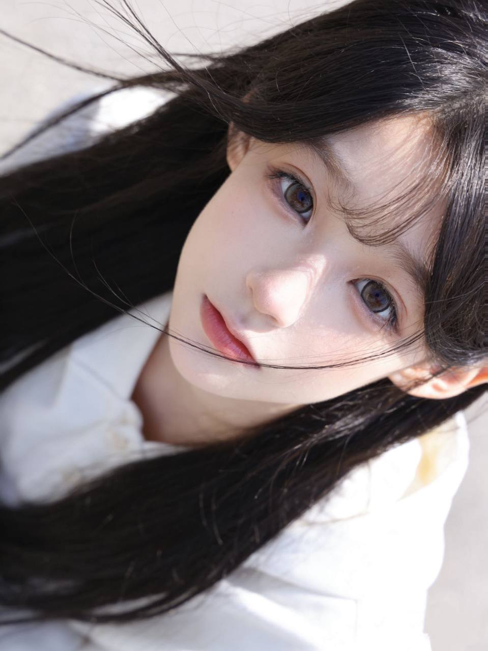 七七